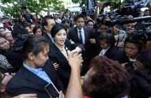 Yingluck pleads  not guilty, gets bail for Bt30 million