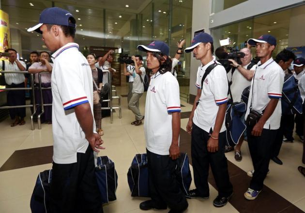 Myanmar fishing industry workers arrive back to Myanmar from Indonesia on May 14./EPA
